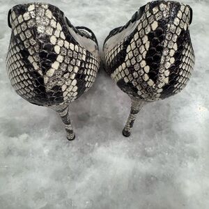 Christian Louboutin Black and Cream Snakeskin Heels